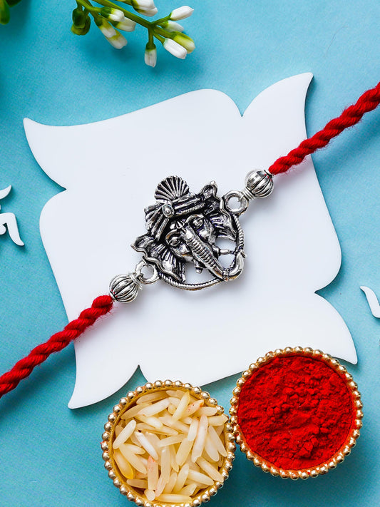 Ganesh Rakhi – Traditional Metal Rakhis – Free Chawal & Kumkum
