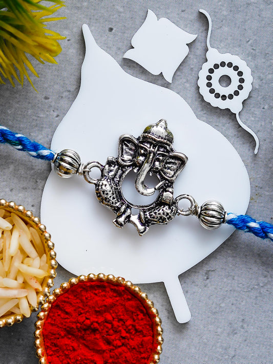 Ganesh Rakhi – Traditional Metal Rakhis – Free Chawal & Kumkum