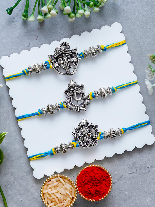 Lord Ganesha Rakhi Set of 3 – Antique Metal Finish – Free Chawal & Kumkum