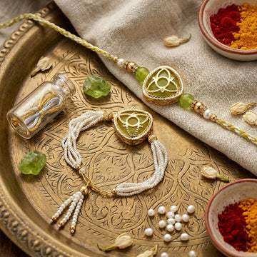 Elegant Pearl Tassel Rakhi Set
