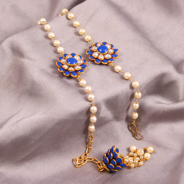Elegant Pearl and Floral Rakhi Set on Silk Drape – Includes Free Chawal & Kumkum