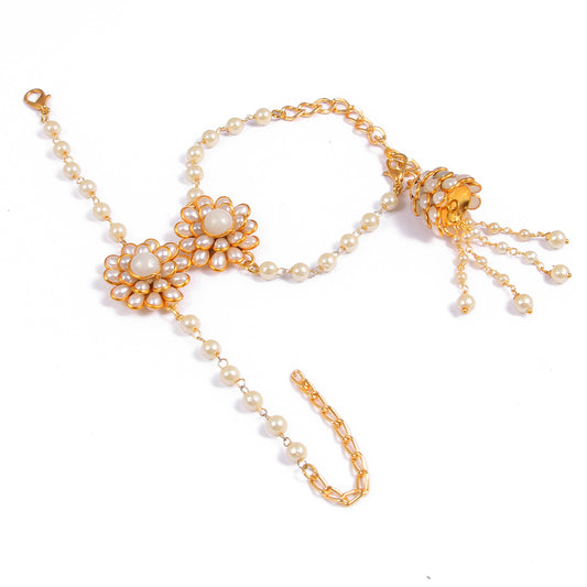 Elegant Pearl and Floral Rakhi Set on Silk Drape – Includes Free Chawal & Kumkum