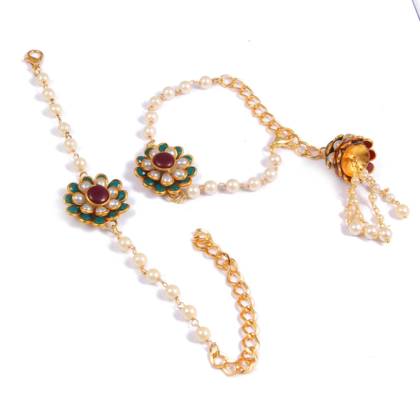 Elegant Pearl and Floral Rakhi Set on Silk Drape – Includes Free Chawal & Kumkum