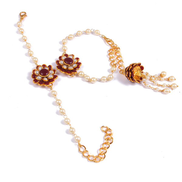 Elegant Pearl and Floral Rakhi Set on Silk Drape – Includes Free Chawal & Kumkum