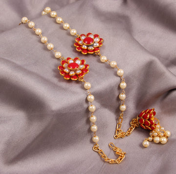 Elegant Pearl and Floral Rakhi Set on Silk Drape – Includes Free Chawal & Kumkum
